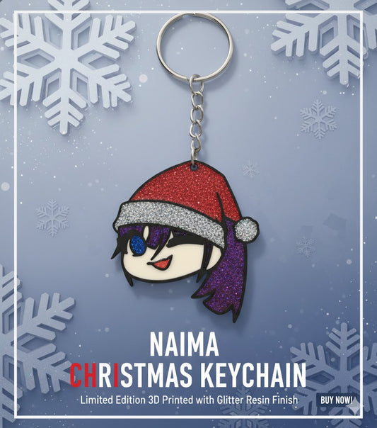 Porte-clé Naima Usseewa Ado version Noël, impression 3D multicouleur avec finition en résine époxy pailletée.